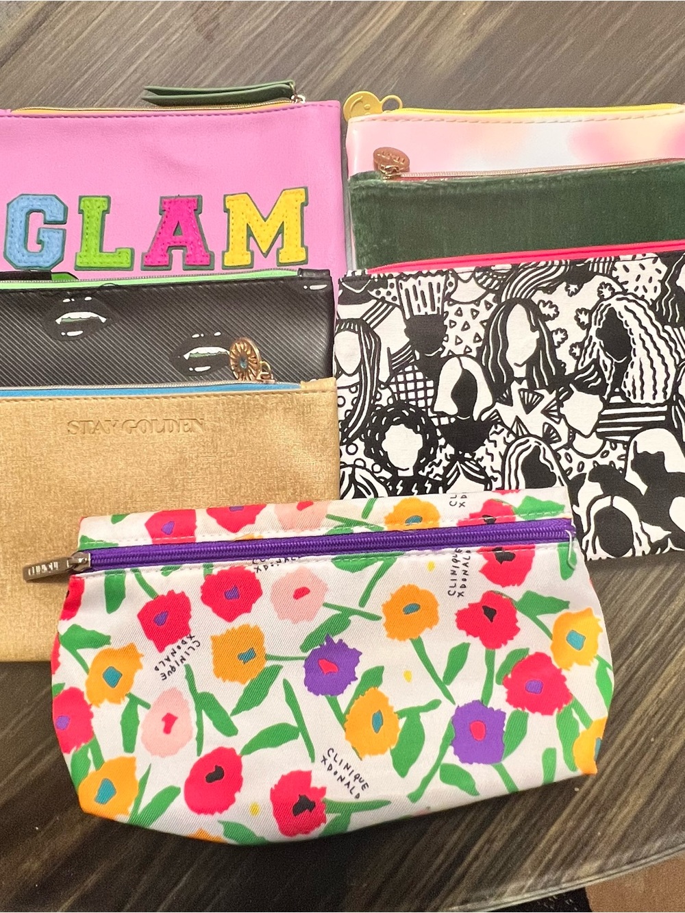 Clinique and Ipsy 7 Zipper Pouches.   Like New